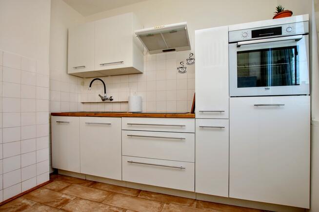 dwa niezależne pokoje, wysoki parter, balkon