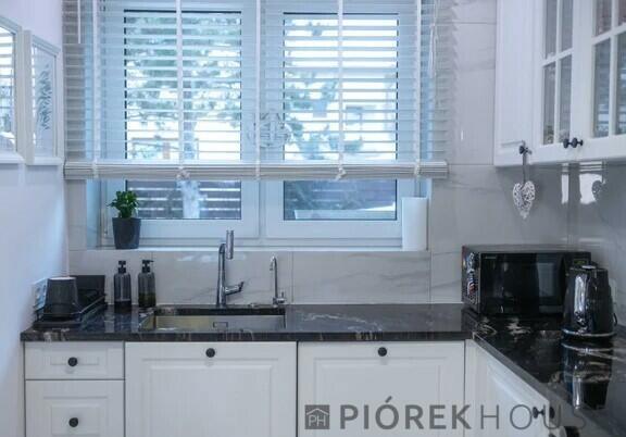 Dwupoziomowe mieszkanie na Wawrze