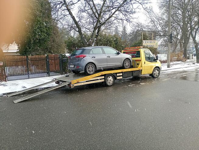 Laweta Łódź Autolaweta Usługi Holowana samochódw