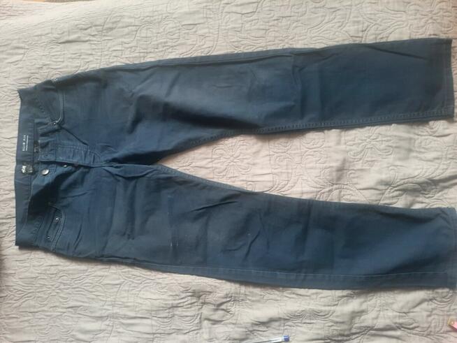 Sprzedam prawie nowe spodnie męskie i bluzę