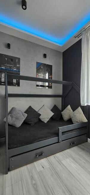 Wyjątkowe łóżko domek z szufladą – miejsce do spania i do za