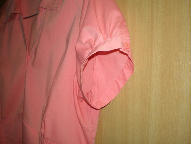 Bluzka damska w rozmiarze L, w kolorze różowym.