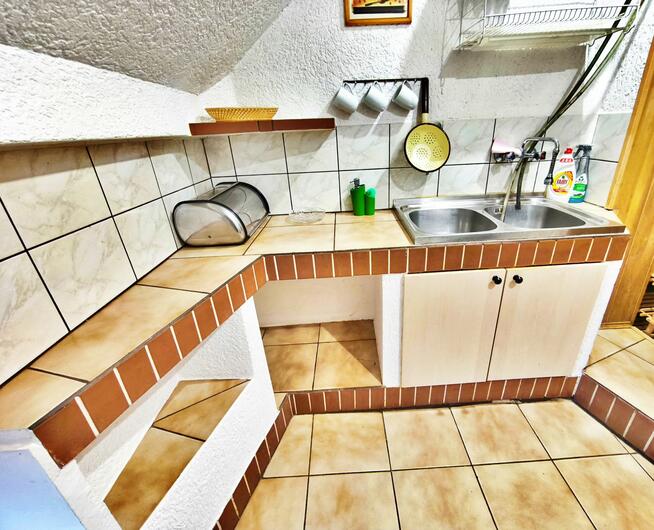 w kamienicy w centrum Olsztynka