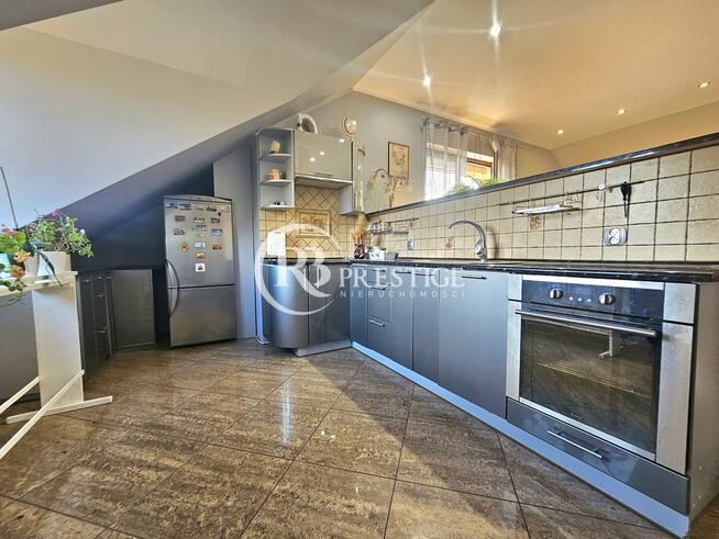 Dom z lokalem usł. pośród zieleni i ciszy.