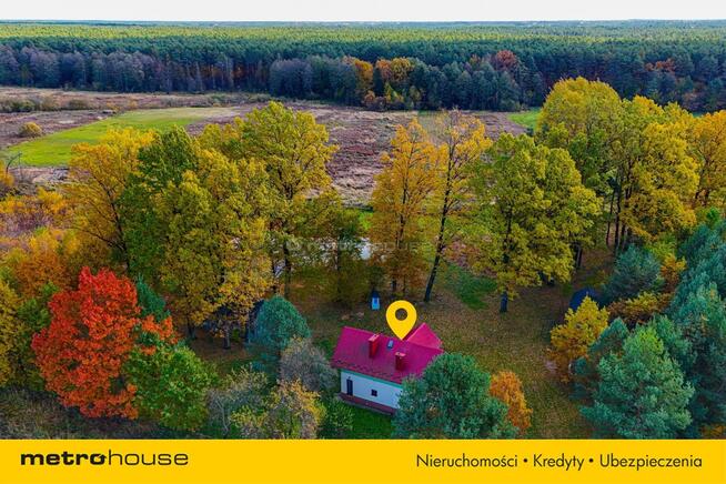 Dom z prywatnym stawem w sercu natury