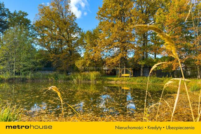 Dom z prywatnym stawem w sercu natury