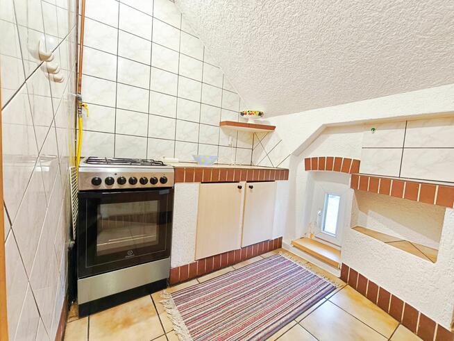 w kamienicy w centrum Olsztynka