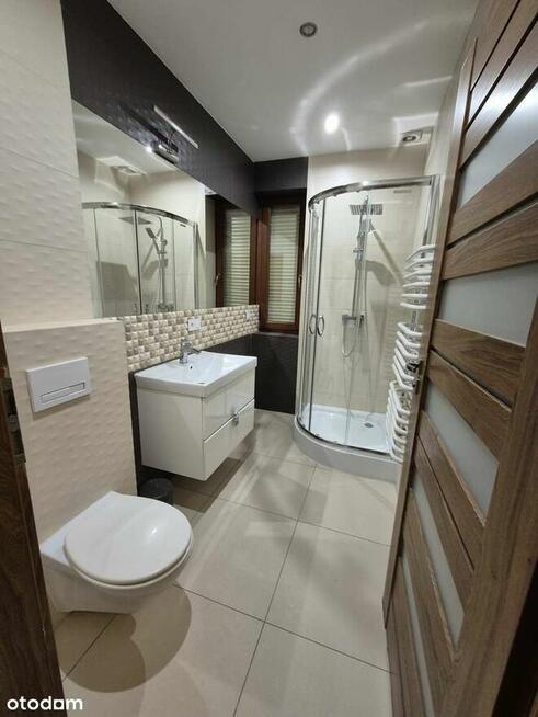 Wolnostojący dom z garażem i ogrodem