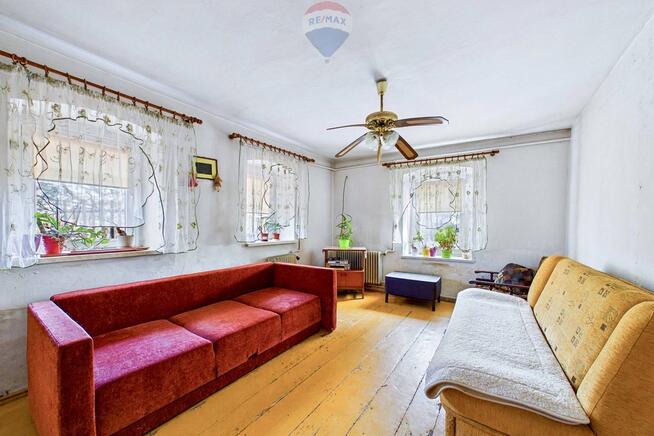 Dom z dużą działką i budynkami gospodarczymi