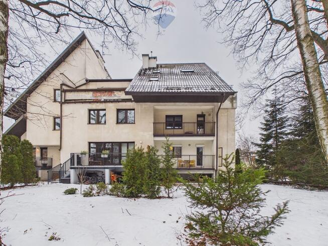 2 pokoje, duże okna, ogródek, garaż, piwnica