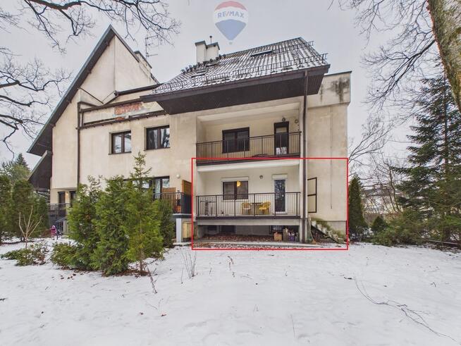 2 pokoje, duże okna, ogródek, garaż, piwnica