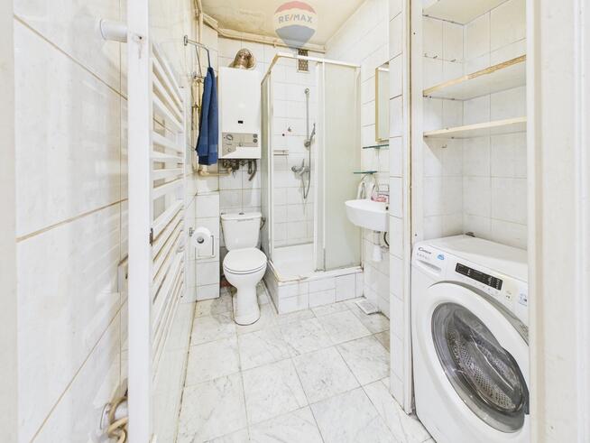 2 pokoje, duże okna, ogródek, garaż, piwnica