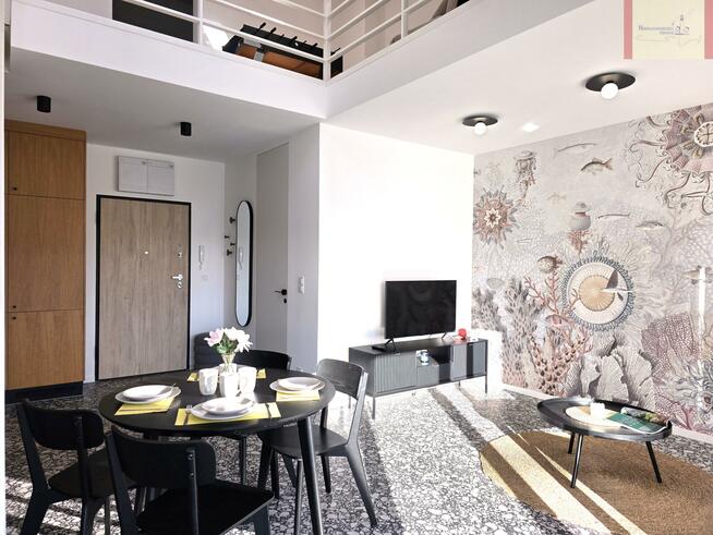 Nowoczesny apartament 2-poziomowy, winda, garaż, morze.