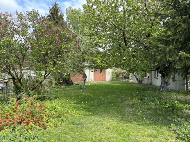 Działka z garażami, pozwoleniem na bud. projektem.