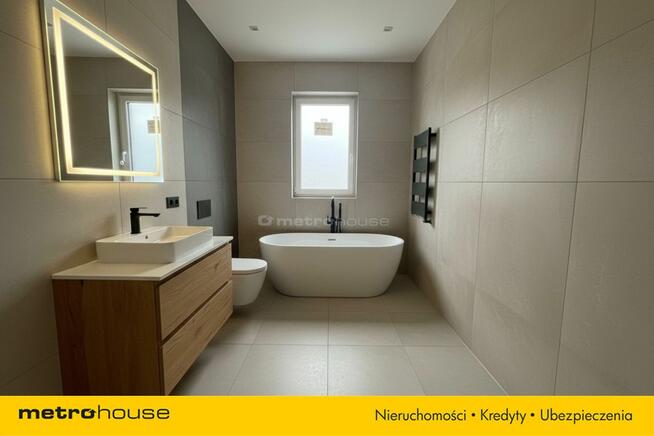 Dom parterowy wolnostojący - pompa ciepła, kominek