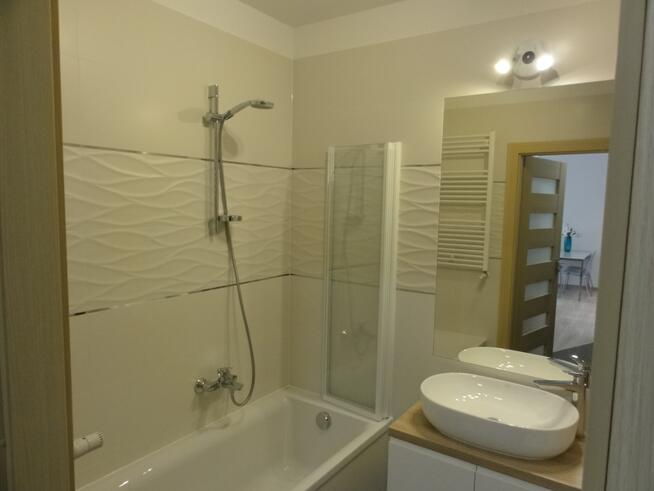 Wynajem-mieszkanie z miejscem garażowym i komórką