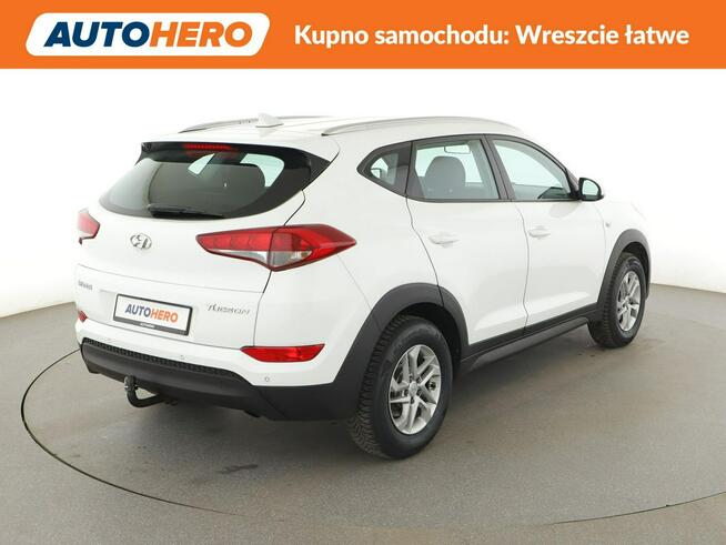 Hyundai Tucson navi klimatyzacja grzane fotele kamera i czujniki parkowania hak
