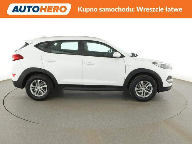 Hyundai Tucson navi klimatyzacja grzane fotele kamera i czujniki parkowania hak