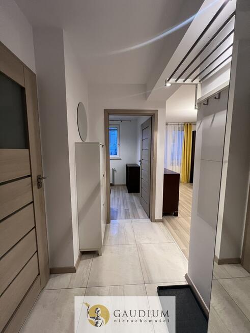 2 - pok. mieszkanie z miejscem postojowym w hali