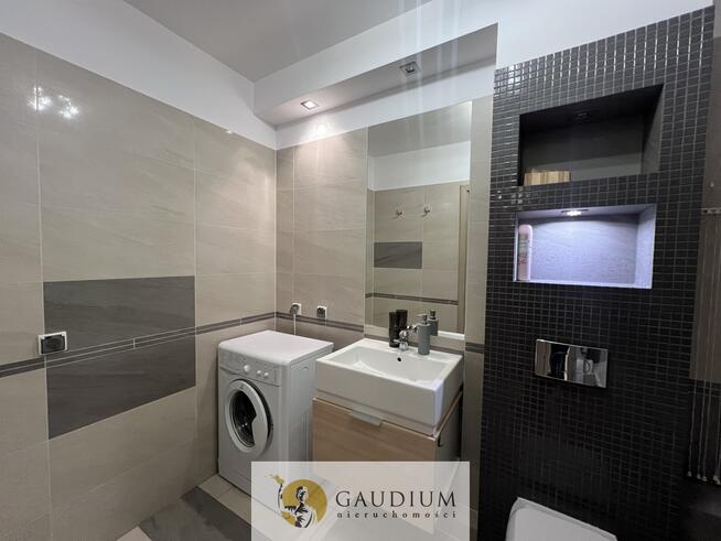 2 - pok. mieszkanie z miejscem postojowym w hali