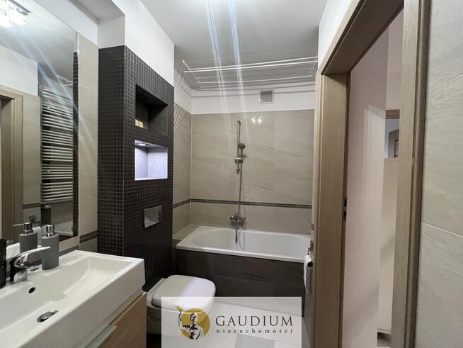 2 - pok. mieszkanie z miejscem postojowym w hali