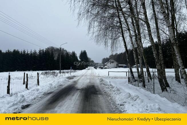 Służewo, działka ze stawem, częściowo zadrzewiona.