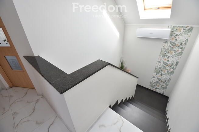 Dom wolnostojący, garaż pompa ciepła, fotowoltaika