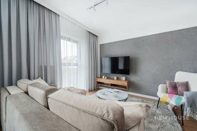 48 m2 z widokiem na J. Mikołajskie, taras 18 m2.