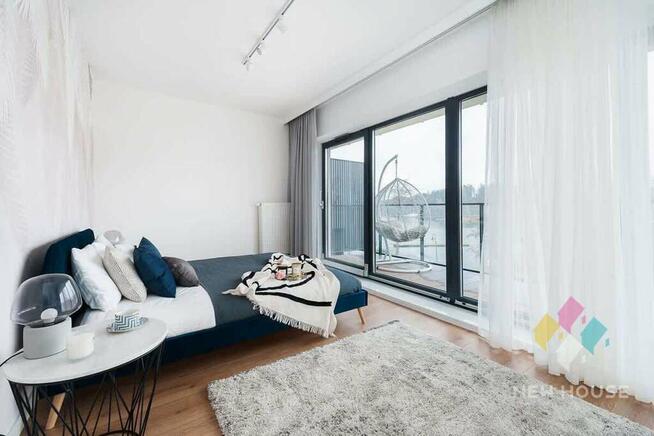 48 m2 z widokiem na J. Mikołajskie, taras 18 m2.