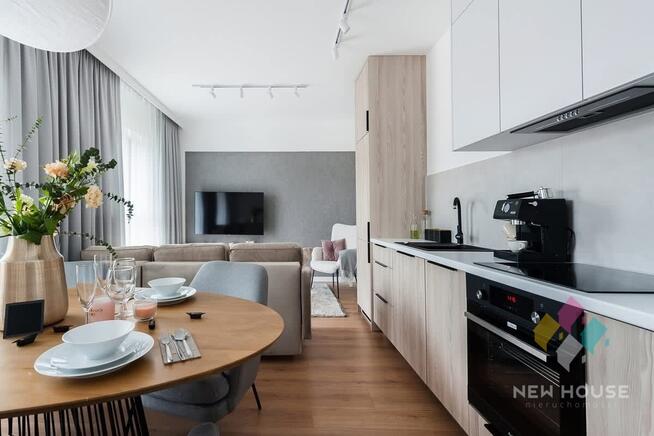 48 m2 z widokiem na J. Mikołajskie, taras 18 m2.