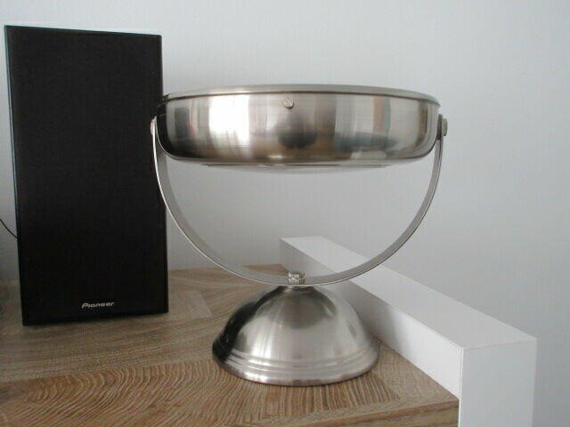 Lustro z zegarem z drugiej strony