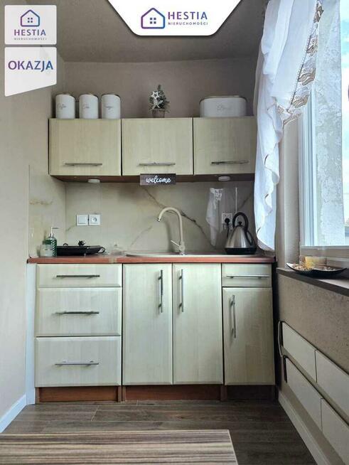 Kawalerka po remoncie z ogrodem