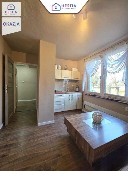 Kawalerka po remoncie z ogrodem