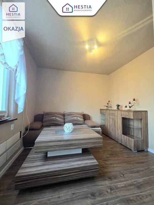 Kawalerka po remoncie z ogrodem