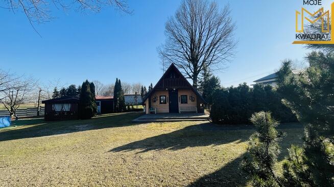 Domek z drewna na działce 1,08 hektara ze stawem !