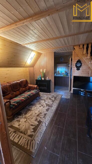 Domek z drewna na działce 1,08 hektara ze stawem !