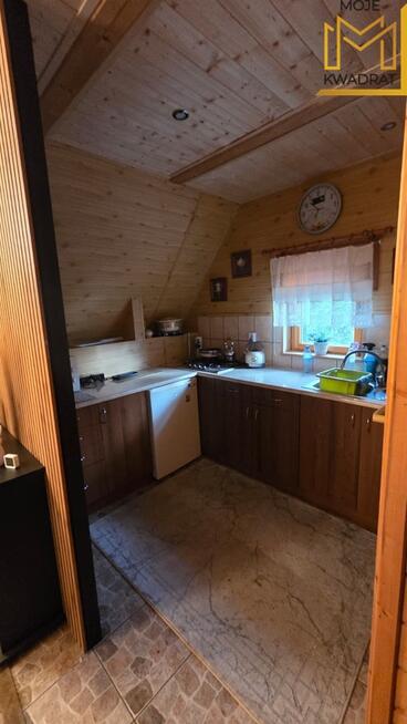 Domek z drewna na działce 1,08 hektara ze stawem !