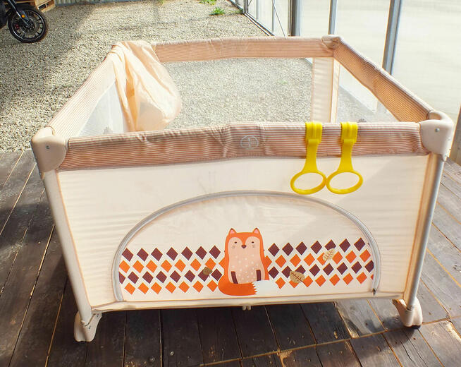 Kojec dziecięcy LIONELO składany otwierany uchwyty koła hamu