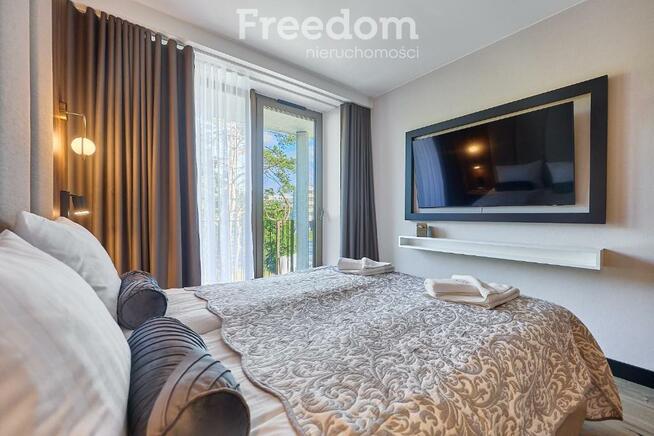 Apart 3 pok. nad promenadą, duży narożny taras.