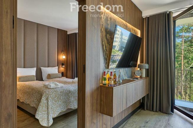 Apart 3 pok. nad promenadą, duży narożny taras.