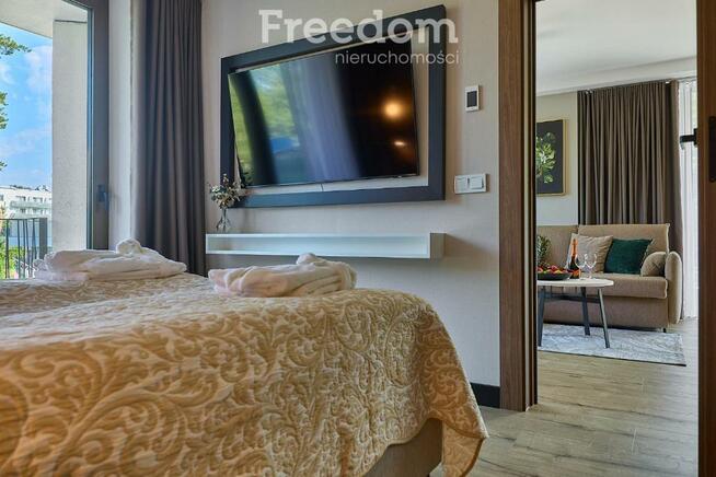 Apart 3 pok. nad promenadą, duży narożny taras.