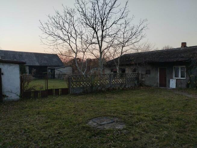 Sprzedam działkę z zabudowaniami
