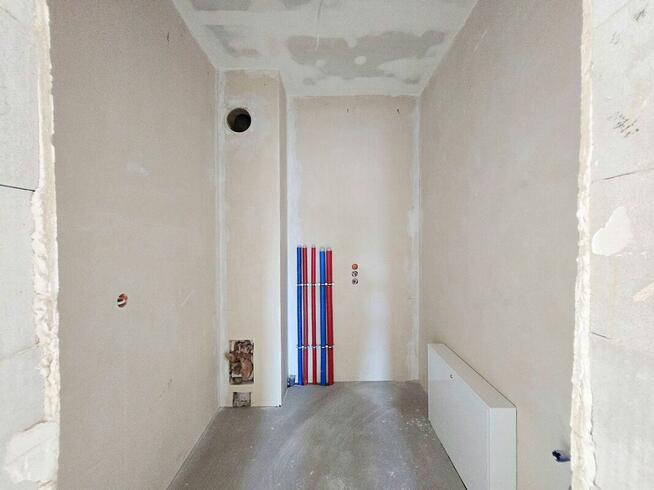 nowy dom parterowy na nowo budującym się osiedlu Juryszewo