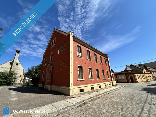 Działka zabudowana budynkiem magazynowo administracyjnym