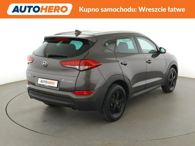 Hyundai Tucson klima auto navi grzane fotele kamera i czujniki parkowania