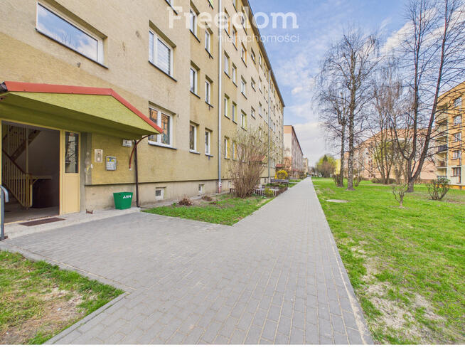 Mieszkanie na parterze z balkonem.