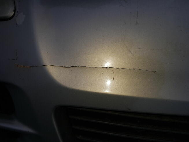 Zderzak przód uszkodzony toyota avensis t25