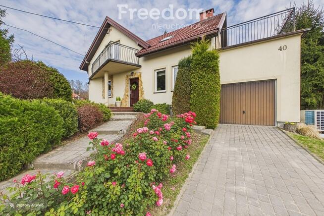 Uroczy, niewielki rodzinny dom wolnostojący.