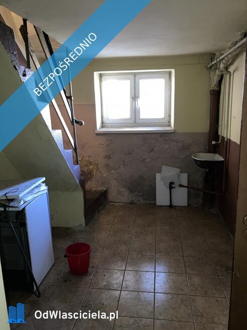Do remontu, przestronny, z budynkami gosp
