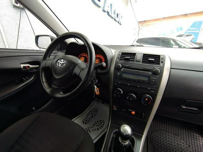 Toyota Corolla FL, klimatyzacja, 6-biegów, el.szyby, podg. fotele, alu, zarejestrowan